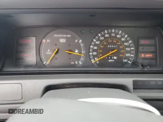 1991 Toyota Camry DLX z VIN 4T1SV21E0MU450578, wystawiony jako Copart lot #73990024 z przebiegiem 149 342 mil mil oraz Czysty tytuł • Clean title. Historia ofert i sprzedaży dostępna na DreamBid. Obrazek 9.