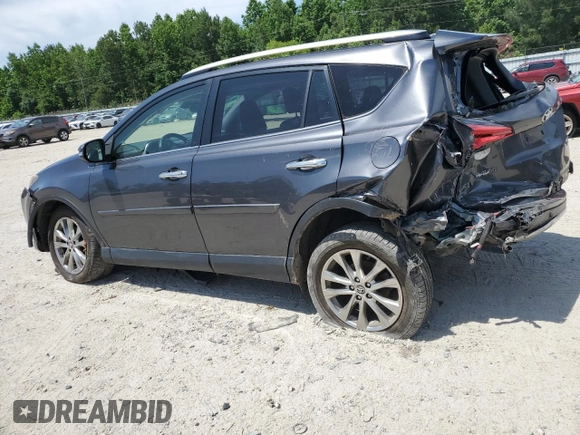 2016 Toyota RAV4 Limited z VIN JTMDFREVXGJ076533, wystawiony jako Copart lot #57480995 z przebiegiem 124 626 mil mil oraz Szkoda całkowita • Salvage title. Historia ofert i sprzedaży dostępna na DreamBid. Obrazek 2.