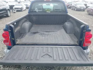 2005 Dodge Dakota SLT with VIN 1D7HW48K35S188089, listed as a IAAI auction lot 41778459 with 138,539 mi miles. Bid and sale history available at carsss.com. Image 8.