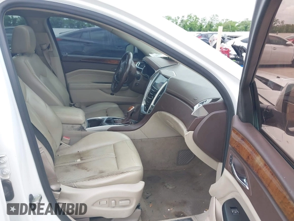 2014 Cadillac SRX Premium Collection with VIN 3GYFNDE31ES615995, listed as a IAAI auction lot 42148943 with 232,752 mi miles and . Bid and sale history available at DreamBid. Image 5.