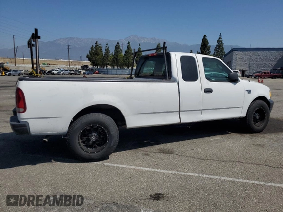 2003 Ford F-150 XL with VIN 1FTRX17W53NA54971, listed as a Copart auction lot 63686385 with 133,800 mi miles and Salvage title. Bid and sale history available at DreamBid. Image 3.