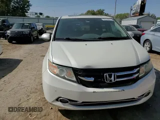 2014 Honda Odyssey Touring z VIN 5FNRL5H92EB059168, wystawiony jako Copart lot #76121914 z przebiegiem 264 715 mil mil oraz Szkoda całkowita • Salvage title. Historia ofert i sprzedaży dostępna na DreamBid. Obrazek 12.