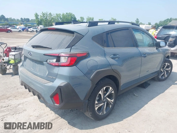 2024 Subaru Crosstrek Premium with VIN JF2GUADC9RH202736, listed as a IAAI auction lot 42735432 with 7,100 mi miles and . Bid and sale history available at DreamBid. Image 4.