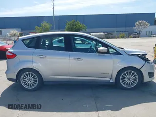 2013 Ford C-Max SEL z VIN 1FADP5BU6DL518893, wystawiony jako IAAI lot #41962282 z przebiegiem 198 219 mil mil oraz . Historia ofert i sprzedaży dostępna na DreamBid. Obrazek 13.