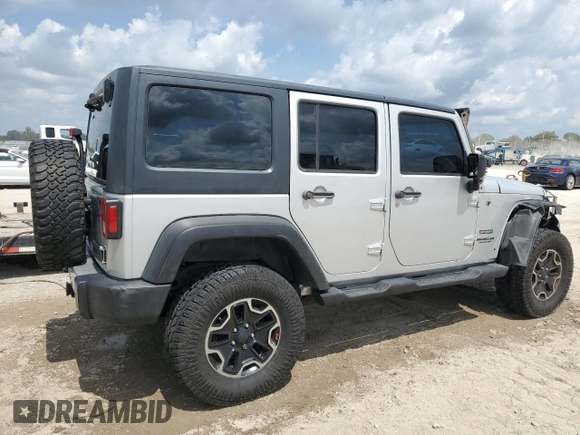 2012 Jeep Wrangler Unlimited Sport z VIN 1C4BJWDG8CL220960, wystawiony jako Copart lot #57823315 z przebiegiem 177 541 mil mil oraz Szkoda całkowita • Salvage title. Historia ofert i sprzedaży dostępna na DreamBid. Obrazek 3.