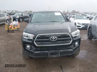 2017 Toyota Tacoma SR5 with VIN 5TFAZ5CN2HX040954, listed as a IAAI auction lot 41733137 with 97,780 mi miles and . Bid and sale history available at DreamBid. Image 12.