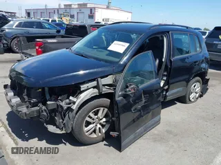 2017 Volkswagen Tiguan S with VIN WVGAV7AX5HK023196, listed as a IAAI auction lot 41999906 with 48,751 mi miles and . Bid and sale history available at DreamBid. Image 2.