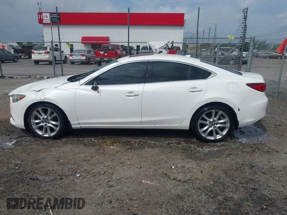 2016 Mazda Mazda6 i Touring with VIN JM1GJ1V56G1448334, listed as a IAAI auction lot 42075222 with 52,883 mi miles. Bid and sale history available at carsss.com. Image 14.