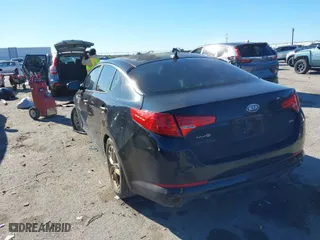 2011 Kia Optima LX with VIN KNAGM4A7XB5133681, listed as a IAAI auction lot 41602973 with 210,615 mi miles. Bid and sale history available at carsss.com. Image 3.