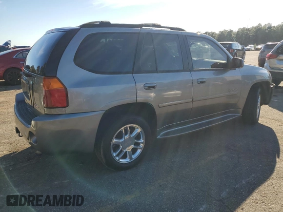 2006 GMC Envoy Denali with VIN 1GKES63M962257466, listed as a Copart auction lot 76821124 with 171,266 mi miles and Salvage Title. Bid and sale history available at carsss.com. Image 3.