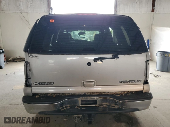 2004 Chevrolet Tahoe LT with VIN 1GNEC13Z14J323770, listed as a Copart auction lot 57846675 with 140,232 mi miles and Salvage title. Bid and sale history available at DreamBid. Image 6.