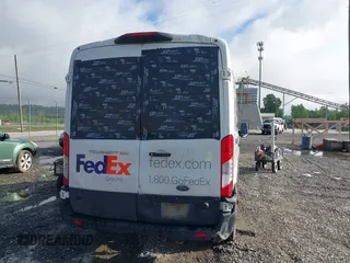 2020 Ford Transit Cargo z VIN 1FTBR1C87LKA51039, wystawiony jako IAAI lot #42212523 z przebiegiem 183 020 mil mil oraz . Historia ofert i sprzedaży dostępna na DreamBid. Obrazek 16.