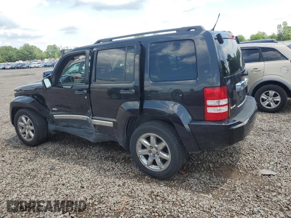 2012 Jeep Liberty Sport with VIN 1C4PJMAK9CW182088, listed as a Copart auction lot 61964575 with 107,911 mi miles and Salvage title. Bid and sale history available at DreamBid. Image 2.