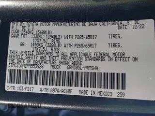 2023 Toyota Tacoma SR with VIN 3TMCZ5AN2PM553928, listed as a IAAI auction lot 40999044 with 9,210 mi miles and . Bid and sale history available at DreamBid. Image 9.