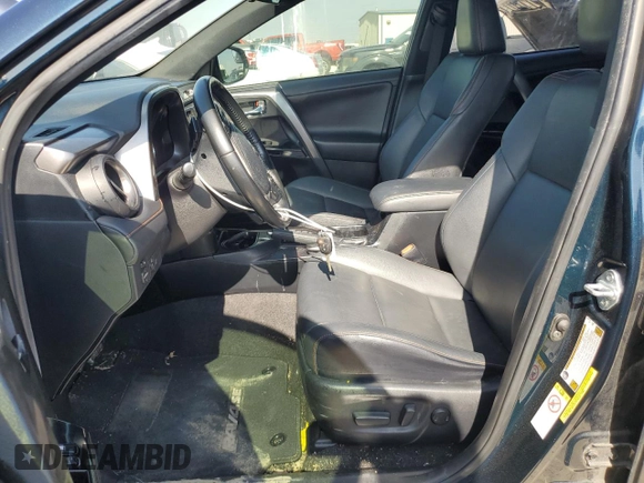 2017 Toyota RAV4 SE with VIN JTMNFREV7HJ142221, listed as a Copart auction lot 86334074 with 123,165 mi miles and Salvage title. Bid and sale history available at DreamBid. Image 7.