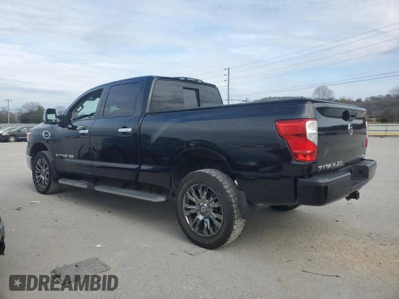 2016 Nissan Titan XD PRO-4X with VIN 1N6BA1F4XGN508153, listed as a Copart auction lot 83017424 with 152,709 mi miles and Clean Title. Bid and sale history available at carsss.com. Image 2.