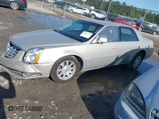 2008 Cadillac DTS 1SC z VIN 1G6KD57Y38U198313, wystawiony jako IAAI lot #42012714 z przebiegiem Nie podano mil oraz . Historia ofert i sprzedaży dostępna na DreamBid. Obrazek 2.