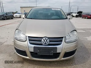 2006 Volkswagen Jetta 1.9L TDI z VIN 3VWDT71KX6M799810, wystawiony jako Copart lot #54946785 z przebiegiem 120 766 mil mil oraz Szkoda całkowita • Salvage title. Historia ofert i sprzedaży dostępna na DreamBid. Obrazek 5.