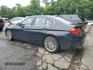 2014 BMW 3 Series 328i with VIN WBA3C1C5XEK105543, listed as a Copart auction lot 58548015 with 156,721 mi miles and Salvage title. Bid and sale history available at DreamBid. Image 2.