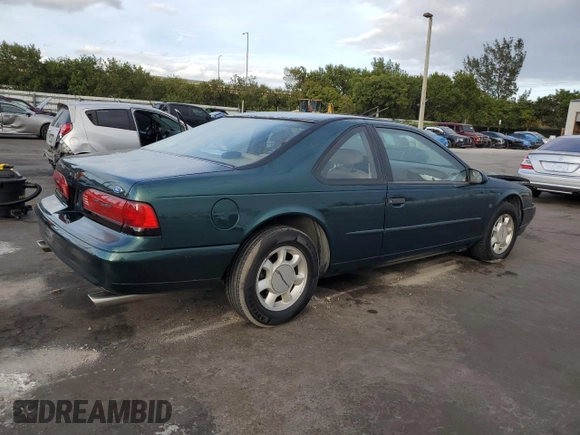 1994 Ford Thunderbird LX with VIN 1FALP62W6RH128762, listed as a Copart auction lot 84306604 with 68,314 mi miles and Salvage Title. Bid and sale history available at DreamBid. Image 3.