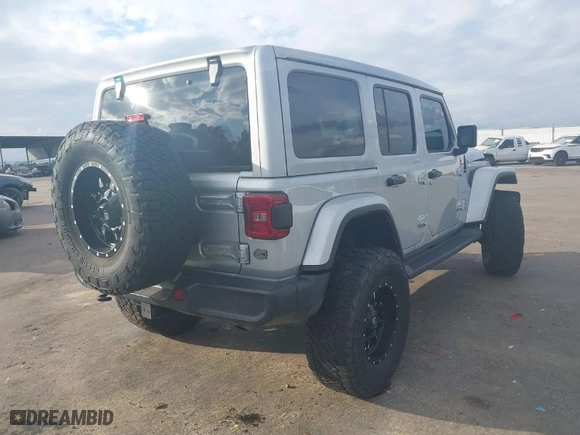 2022 Jeep Wrangler Unlimited Sahara with VIN 1C4HJXEG2NW254523, listed as a IAAI auction lot 41423812 with 56,372 mi miles. Bid and sale history available at carsss.com. Image 4.
