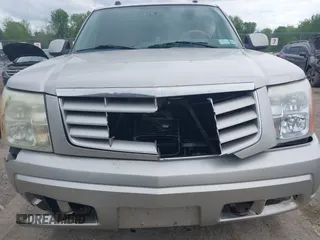 2004 Cadillac Escalade z VIN 1GYEK63N14R177291, wystawiony jako IAAI lot #42263535 z przebiegiem 170 550 mil mil oraz . Historia ofert i sprzedaży dostępna na DreamBid. Obrazek 6.