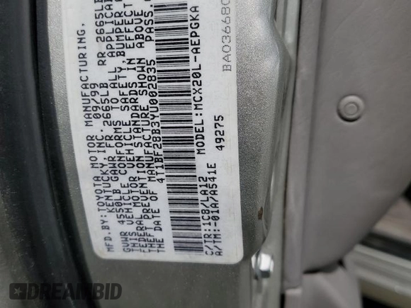 2000 Toyota Avalon XL with VIN 4T1BF28B3YU002835, listed as a Copart auction lot 50902115 with 128,699 mi miles and Salvage Title. Bid and sale history available at DreamBid. Image 12.
