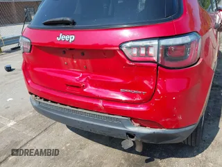 2018 Jeep Compass Sport with VIN 3C4NJCABXJT308768, listed as a IAAI auction lot 42420499 with 84,285 mi miles and . Bid and sale history available at DreamBid. Image 6.