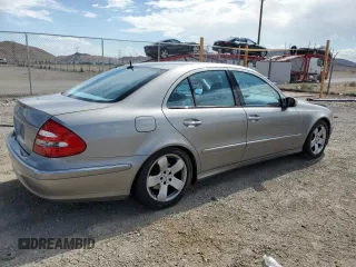 2004 Mercedes-Benz E-Class 5.0L with VIN WDBUF70J54A496963, listed as a Copart auction lot 64214634 with 113,575 mi miles and Salvage Title. Bid and sale history available at carsss.com. Image 3.