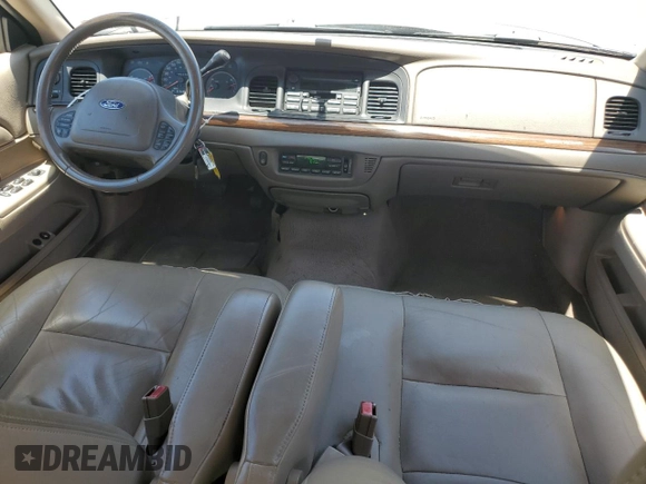 2003 Ford Crown Victoria LX z VIN 2FAFP74W43X123583, wystawiony jako Copart lot #57677555 z przebiegiem 185 336 mil mil oraz Szkoda całkowita • Salvage title. Historia ofert i sprzedaży dostępna na DreamBid. Obrazek 8.