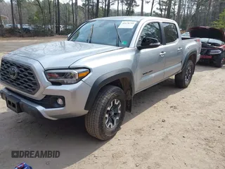 2022 Toyota Tacoma SR with VIN 3TMCZ5ANXNM497511, listed as a IAAI auction lot 41670710 with 26,277 mi miles and . Bid and sale history available at DreamBid. Image 17.