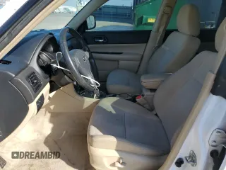 2007 Subaru Forester X w/Premium Pkg with VIN JF1SG656X7H706866, listed as a Copart auction lot 74539254 with 153,236 mi miles and Salvage Title. Bid and sale history available at carsss.com. Image 7.