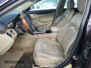 2009 Cadillac CTS AWD z VIN 1G6DG577190129300, wystawiony jako Copart lot #55802785 z przebiegiem 166 399 mil mil oraz Szkoda całkowita • Salvage title. Historia ofert i sprzedaży dostępna na DreamBid. Obrazek 7.