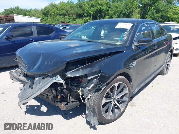 2014 Ford Taurus SEL with VIN 1FAHP2E8XEG133992, listed as a IAAI auction lot 42223678 with 201,204 mi miles and . Bid and sale history available at DreamBid. Image 2.