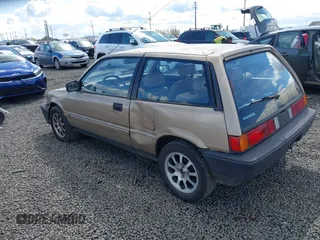 1986 Honda Civic z VIN JHMAH5325GS018658, wystawiony jako IAAI lot #41946339 z przebiegiem 69 518 mil mil oraz . Historia ofert i sprzedaży dostępna na DreamBid. Obrazek 3.