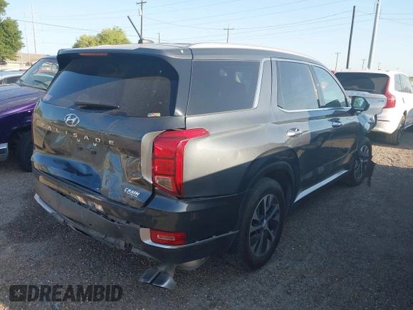 2021 Hyundai Palisade SEL z VIN KM8R24HE1MU194945, wystawiony jako IAAI lot #41987070 z przebiegiem 77 331 mil mil oraz . Historia ofert i sprzedaży dostępna na DreamBid. Obrazek 4.