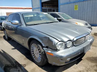 2006 Jaguar XJ Vanden Plas with VIN SAJWA82BX6SH09069, listed as a Copart auction lot 68122604 with 153,999 mi miles and Salvage Title. Bid and sale history available at carsss.com. Image 4.