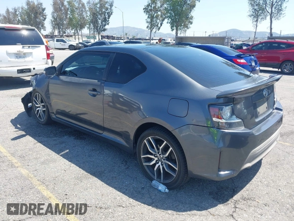 2015 Scion tC with VIN JTKJF5C74F3090309, listed as a IAAI auction lot 41988036 with 158,240 mi miles. Bid and sale history available at carsss.com. Image 3.