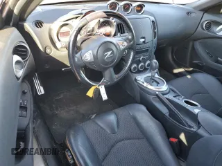2014 Nissan 370Z Touring with VIN JN1AZ4FH3EM620195, listed as a Copart auction lot 83207104 with 66,974 mi miles and Salvage Title. Bid and sale history available at DreamBid. Image 8.
