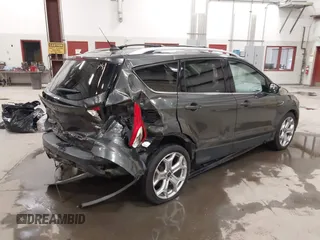 2019 Ford Escape Titanium with VIN 1FMCU9J91KUB11957, listed as a IAAI auction lot 41928264 with 72,460 mi miles. Bid and sale history available at carsss.com. Image 4.