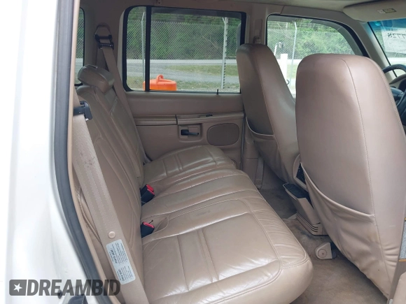 1999 Ford Explorer XLT z VIN 1FMZU34E1XZA39121, wystawiony jako IAAI lot #42107728 z przebiegiem 194 374 mil mil oraz . Historia ofert i sprzedaży dostępna na DreamBid. Obrazek 8.