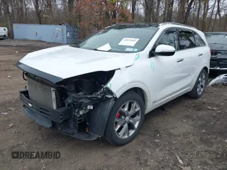 2018 Kia Sorento SX with VIN 5XYPKDA51JG405998, listed as a IAAI auction lot 41837641 with 138,909 mi miles and . Bid and sale history available at carsss.com. Image 2.