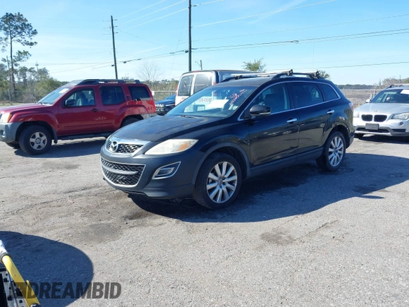 2010 Mazda CX-9 Touring with VIN JM3TB2MA2A0200201, listed as a IAAI auction lot 41631321 with 264,210 mi miles and . Bid and sale history available at DreamBid. Image 2.