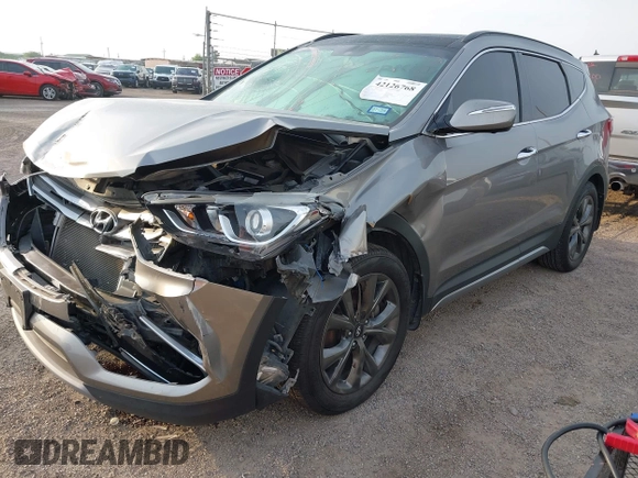 2018 Hyundai Santa Fe Ultimate with VIN 5NMZWDLAXJH100108, listed as a IAAI auction lot 42126768 with 68,325 mi miles and . Bid and sale history available at DreamBid. Image 2.