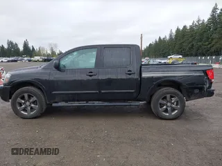 2012 Nissan Titan SV with VIN 1N6BA0EJ0CN303050, listed as a IAAI auction lot 41892370 with 120,018 mi miles. Bid and sale history available at carsss.com. Image 14.