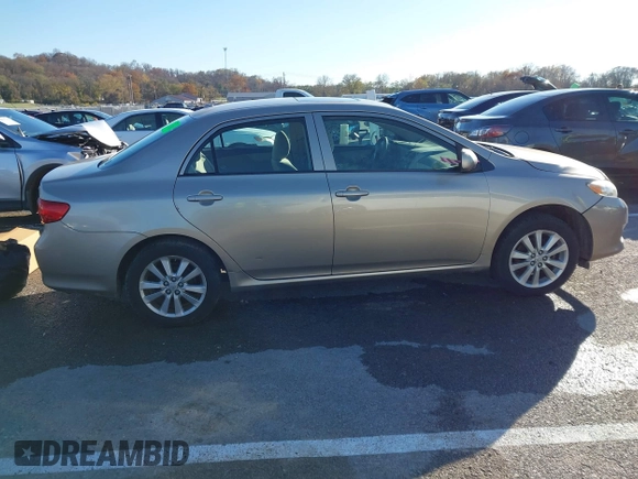 2009 Toyota Corolla with VIN 1NXBU40E59Z164488, listed as a IAAI auction lot 40907058 with 180,161 mi miles. Bid and sale history available at carsss.com. Image 13.