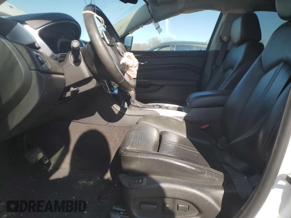 2016 Cadillac SRX Performance Collection with VIN 3GYFNCE38GS576027, listed as a Copart auction lot 52863115 with 85,615 mi miles and Salvage title. Bid and sale history available at DreamBid. Image 7.