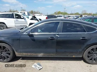 2015 Audi A7 3.0 TDI Premium Plus with VIN WAUWMAFC0FN029822, listed as a IAAI auction lot 41828754 with 148,847 mi miles. Bid and sale history available at carsss.com. Image 14.