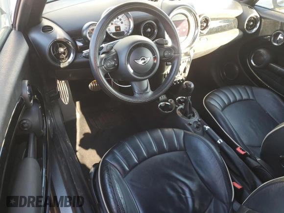 2013 MINI Convertible S with VIN WMWZP3C50DT550800, listed as a Copart auction lot 42409015 with 101,421 mi miles and Salvage title. Bid and sale history available at DreamBid. Image 8.