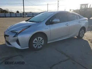 2018 Toyota Prius Two z VIN JTDKBRFU1J3058409, wystawiony jako Copart lot #51275865 z przebiegiem 170 625 mil mil oraz Szkoda całkowita • Salvage title. Historia ofert i sprzedaży dostępna na DreamBid. Obrazek 1.